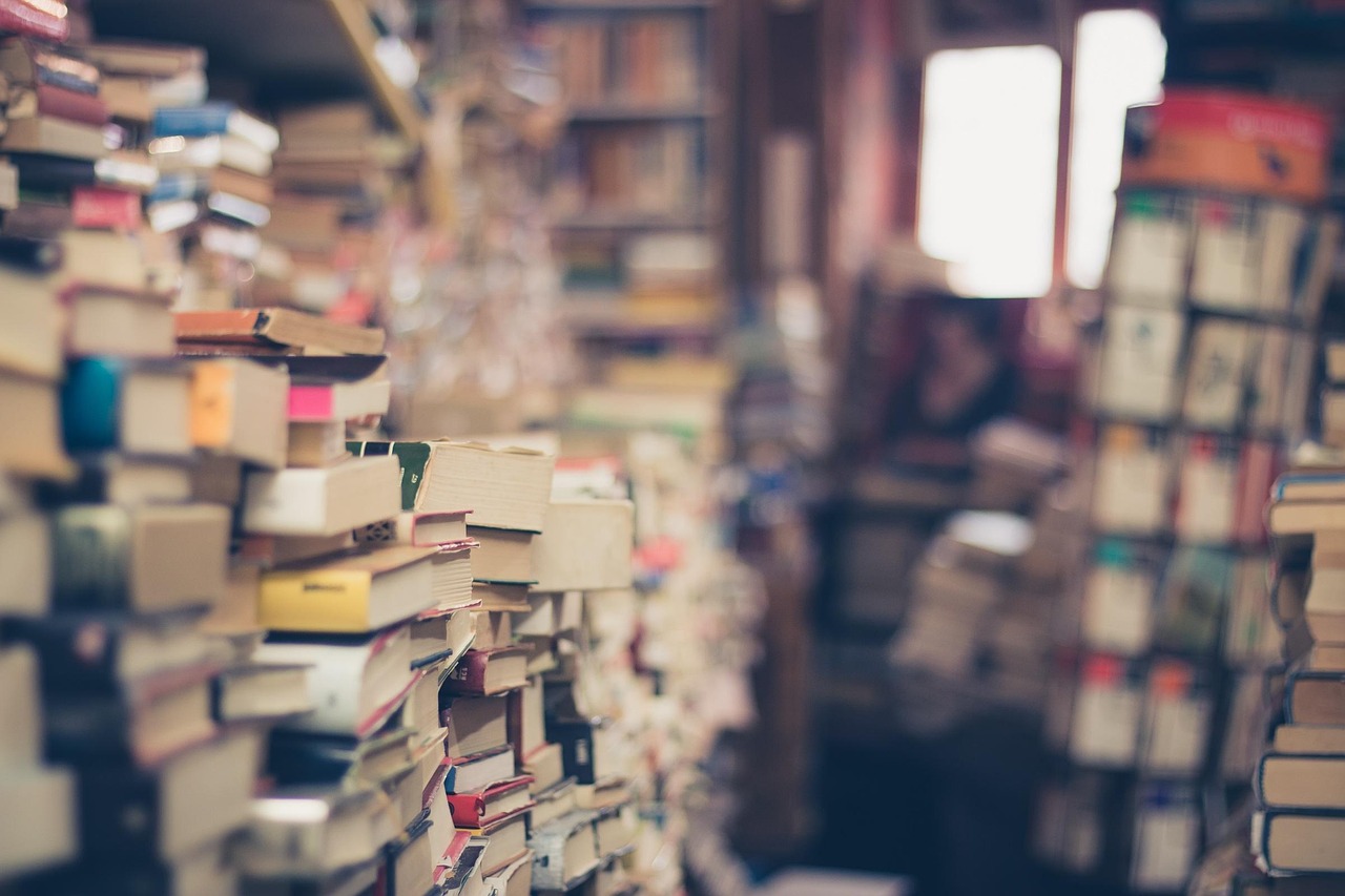 Books, stack, book store — Avoiding Poker Addiction While Playing Online