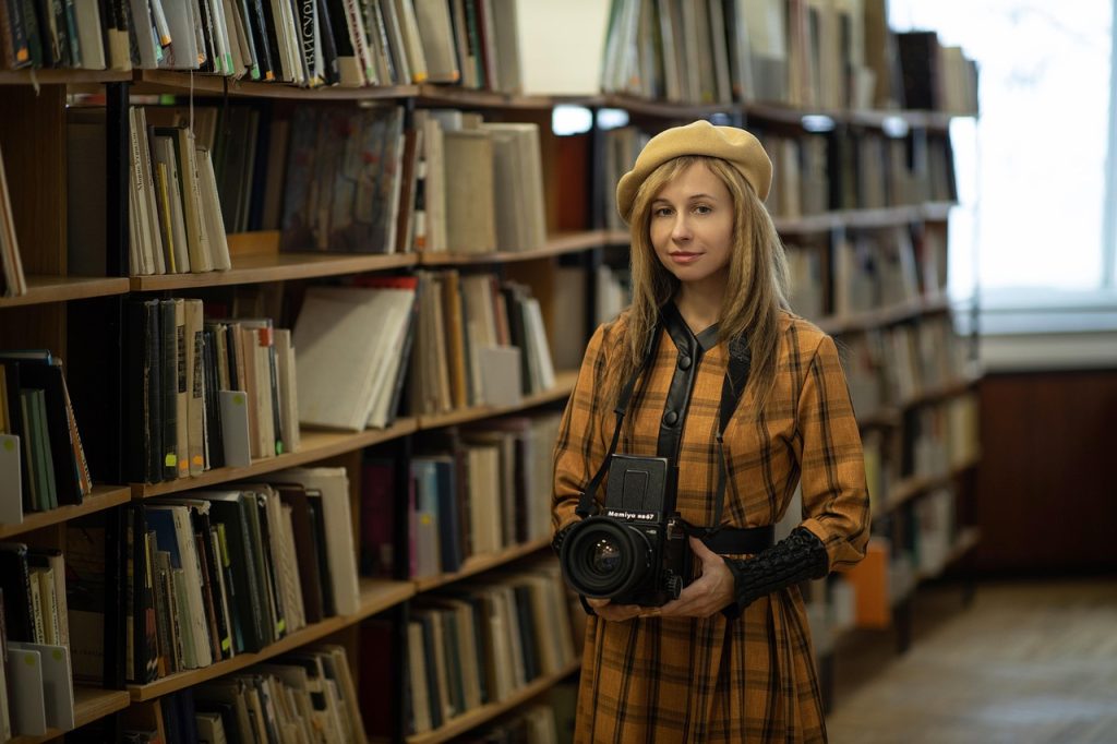Woman, photographer, library — Common Questions New Users Ask
