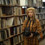 Woman, photographer, library — Common Questions New Users Ask