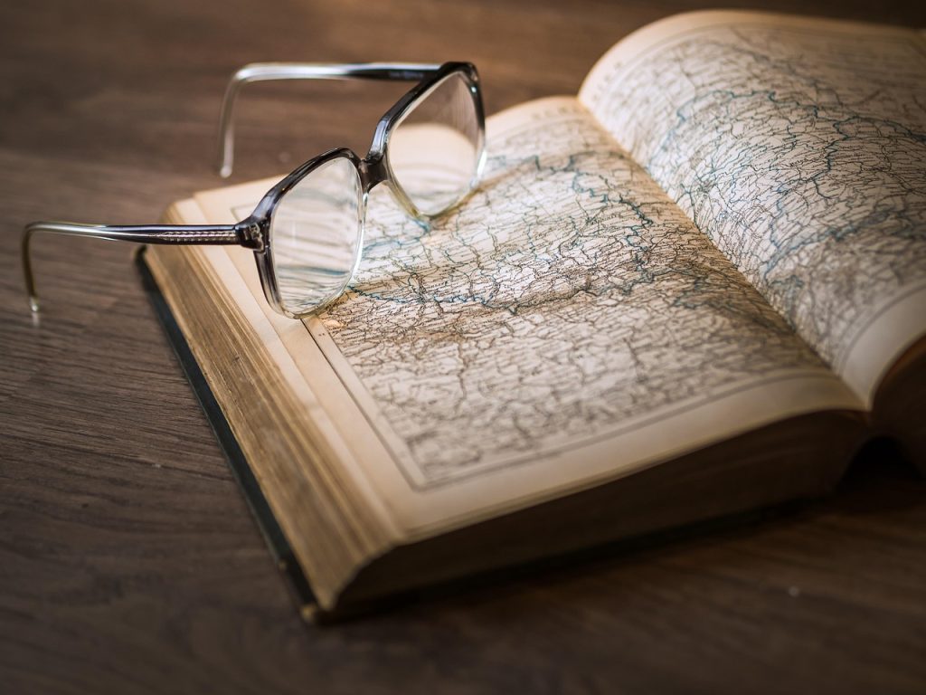 Atlas, book, glasses — Earnings Guide for TC Lottery Referral Program