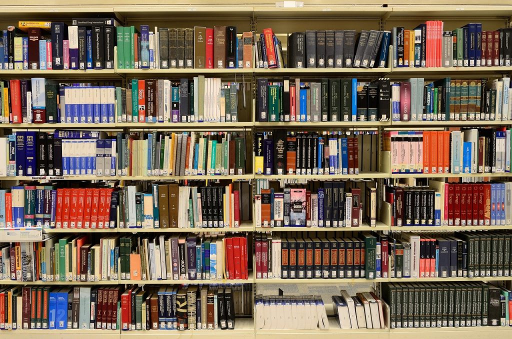 Library, books, bookshelves — How to Identify Fake OK Win Apps
