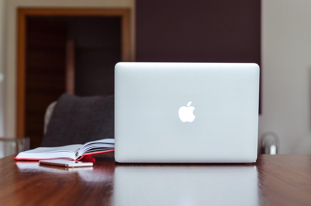 Apple, macbook, notebook — Why Mamma Mia! Still Captivates: Love, Family, and Sunshine Tunes