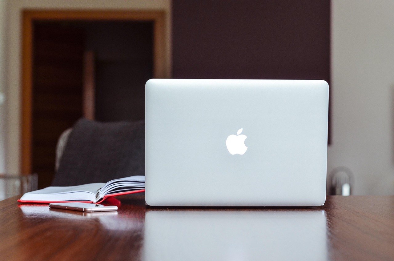 Apple, macbook, notebook — Why Mamma Mia! Still Captivates: Love, Family, and Sunshine Tunes